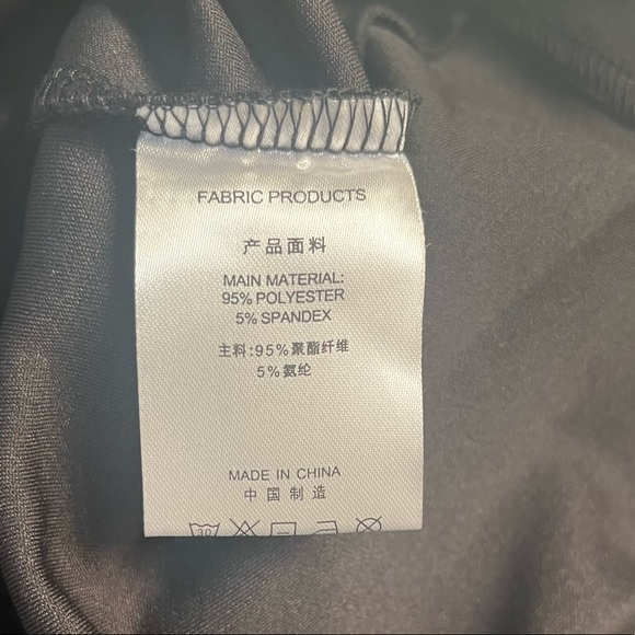 Elegant black dress with flattering ruffle
detail front and over one shoulder. - Picture 3 of 4